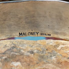 Close up of the artist's stamped signature