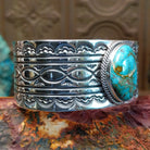 Sterling silver cuff with Sonoran gold turquoise set in twisted rope bezels. 