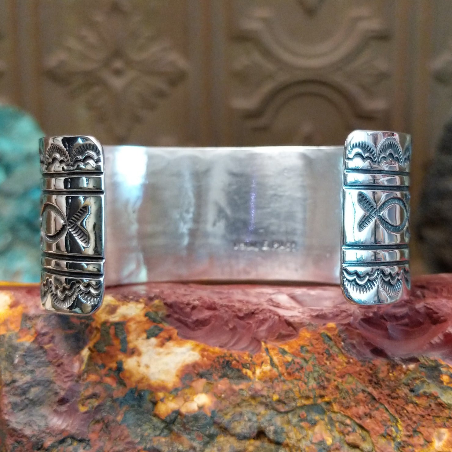 Sterling silver cuff with Sonoran gold turquoise set in twisted rope bezels. 