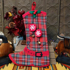 This charming collection of 18-inch Plaid Boot Stockings features cowboy boot designs in assorted plaid patterns with decorative buckles, snowflakes, festive accents, and hanging loops for Western Christmas decorating.