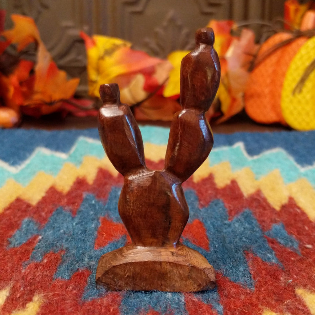 Ironwood smoothed and carved into a prickly pear cactus.