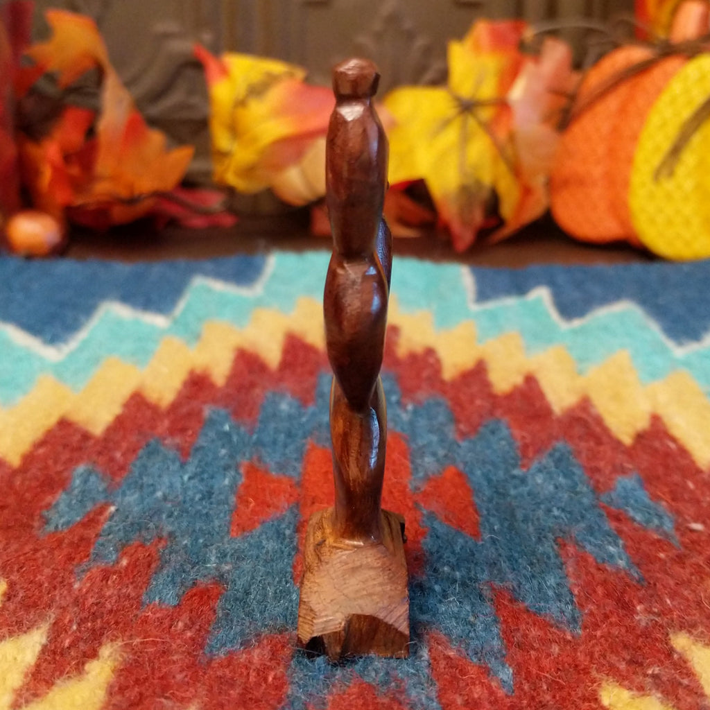 Ironwood smoothed and carved into a prickly pear cactus.