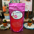 Colorful prickly pear gummy bears arranged in a pile, featuring vibrant pink and purple hues. Soft and chewy candy flavored with the sweet, fruity taste of prickly pear cactus fruit.