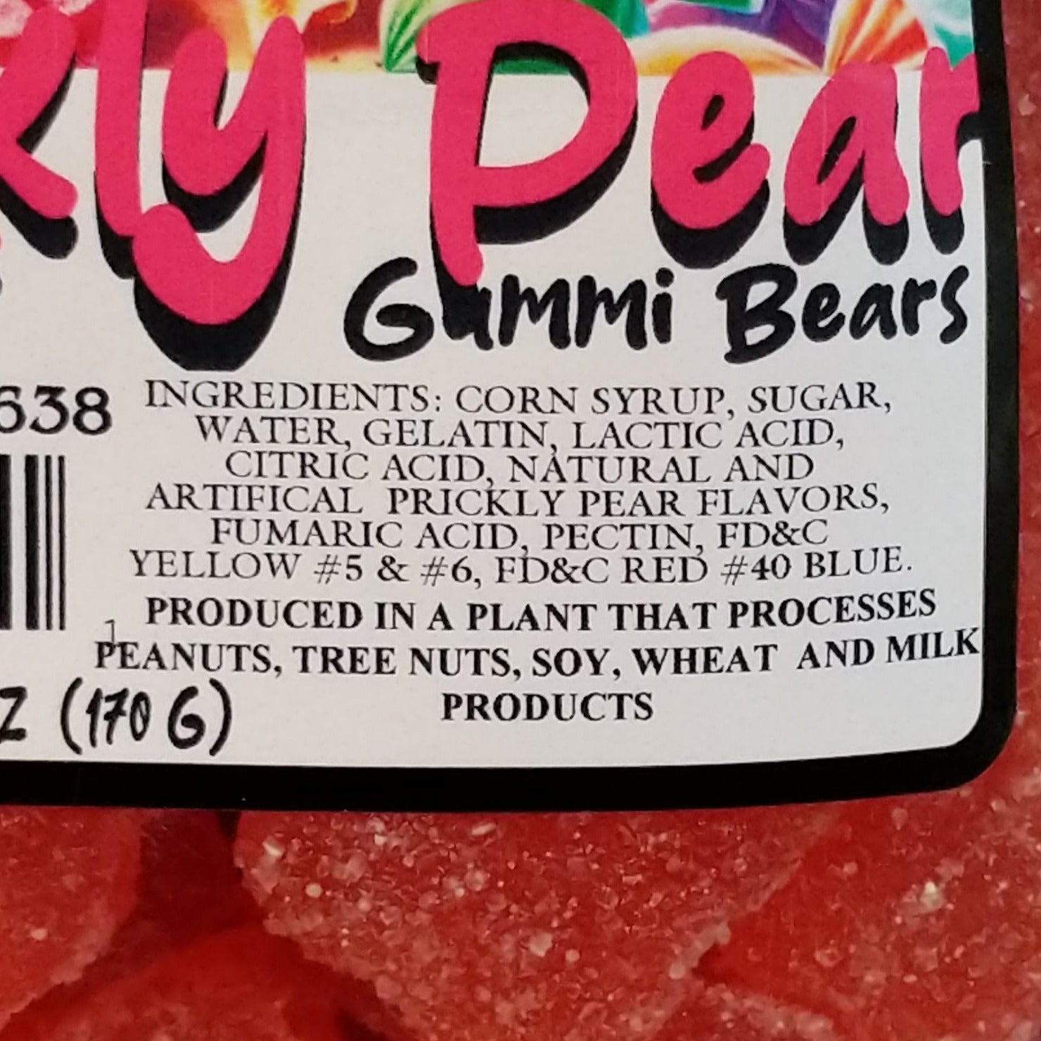 Sour prickly pear gummy bears coated in tangy sugar crystals, displayed in a colorful pile. Vibrant pink gummy candies with a chewy texture and a sweet-tart prickly pear flavor.