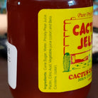 5oz jar of Pure Prickly Pear Cactus Jelly by the Cactus Candy Company. Bright pink-purple fruit jelly made from prickly pear cactus, ideal for spreading on toast, biscuits, and desserts.