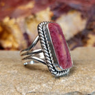 Rectangular purple spiny oyster shell set in a twisted rope bezel with a layered sterling silver band.