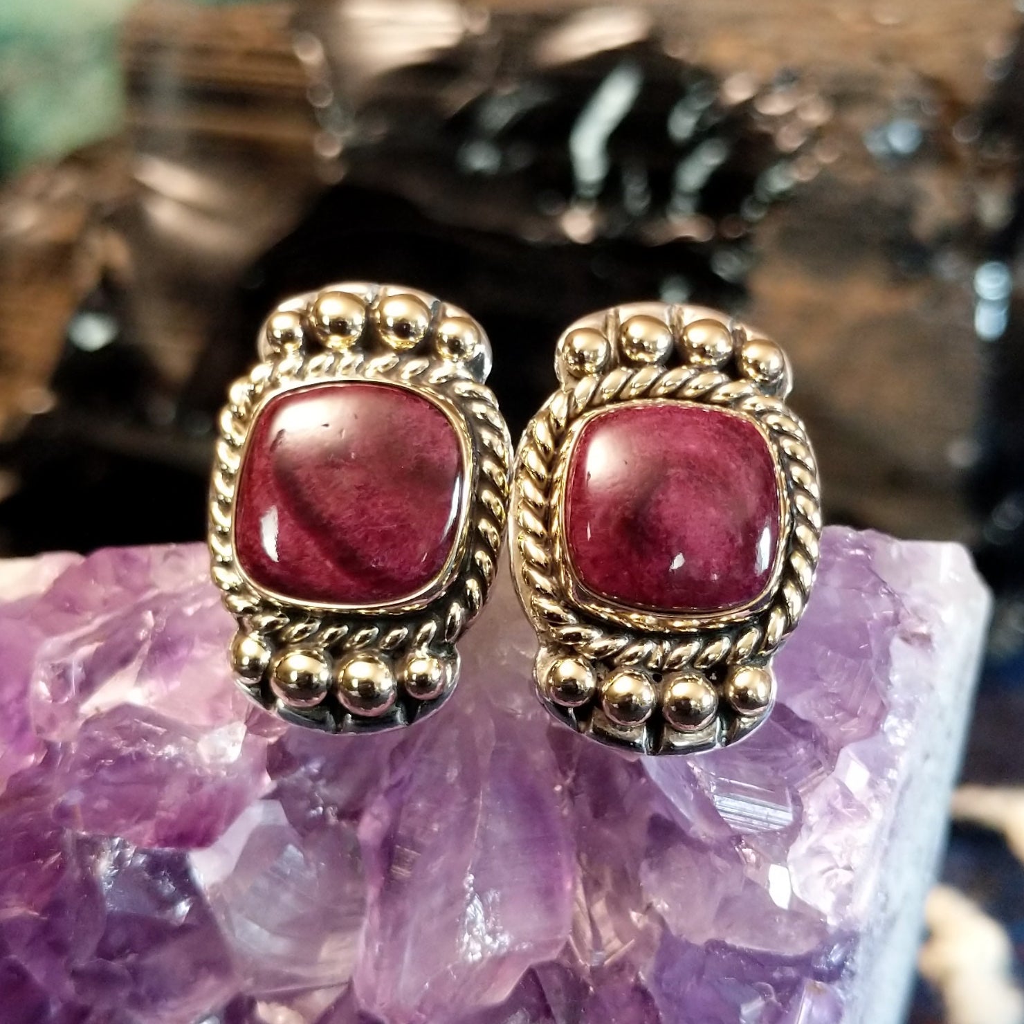 Front shows earrings with purple spiny oyster shell in silver and gold.