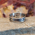 The band with intricate stamp work and semi-polished finish.