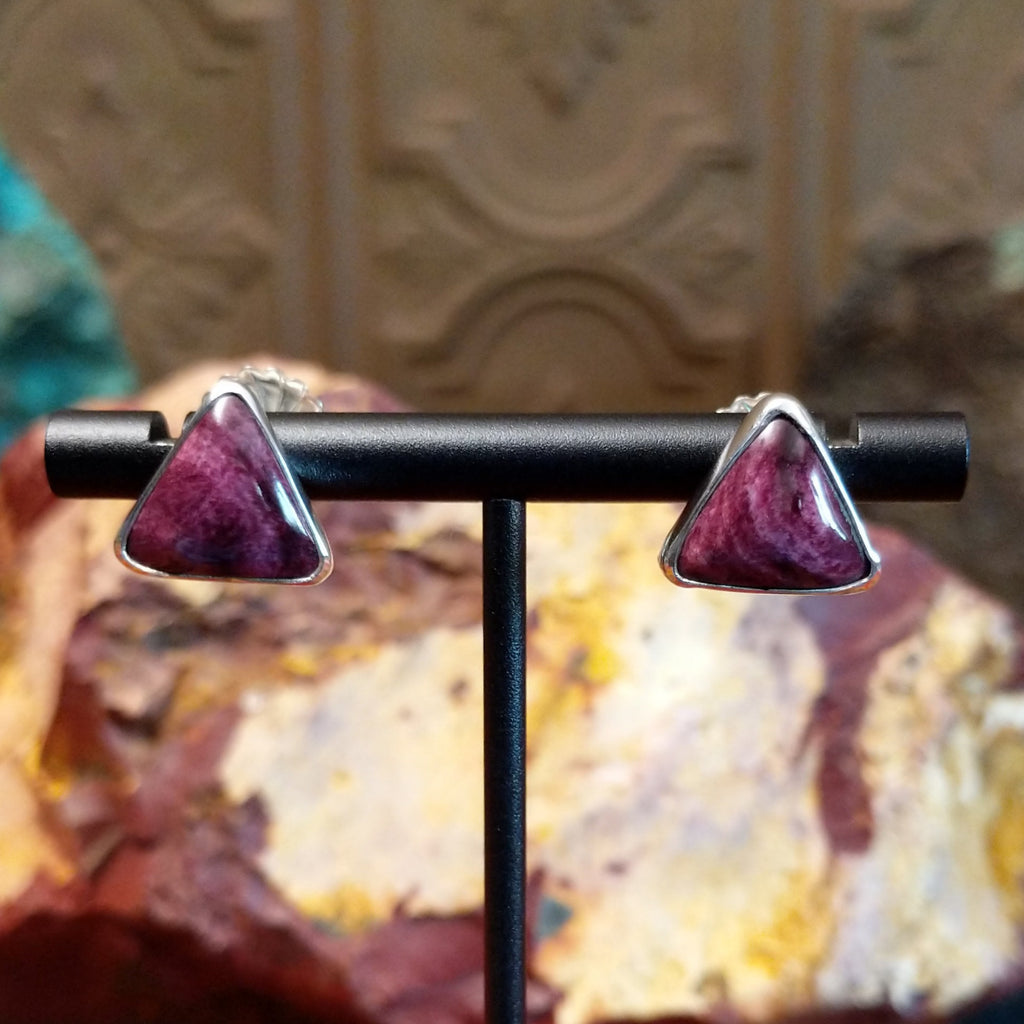 Triangular purple spiny oyster shell earrings set in dainty sterling silver frames.