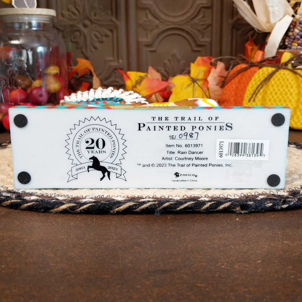 The underside of the base contains information about the piece.