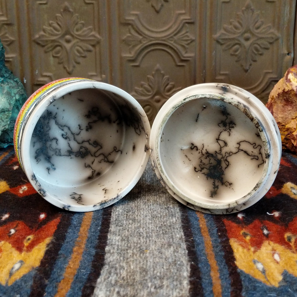 Interior of Rainbow Buffalo jar revealing smooth white clay surface and horsehair texture.