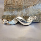 Sterling silver spiral pendant with Austrian crystal.