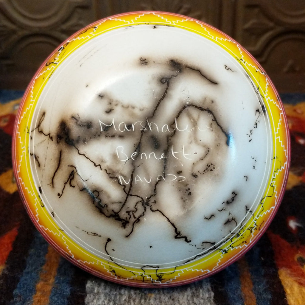 Marshalene Bennett’s signature etched on the pottery base.