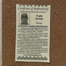 Close up of the Certificate of Authenticity and Artist information. 