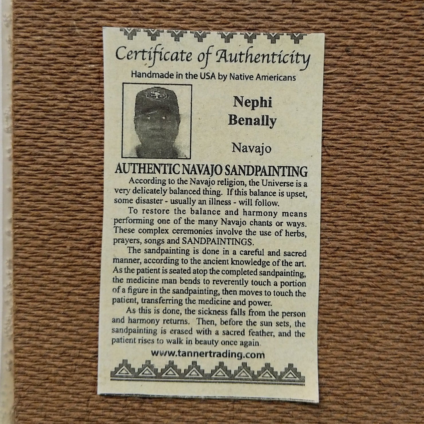 Close up of the Certificate of Authenticity and Artist information. 