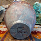 Close-up of the artisan's signature.