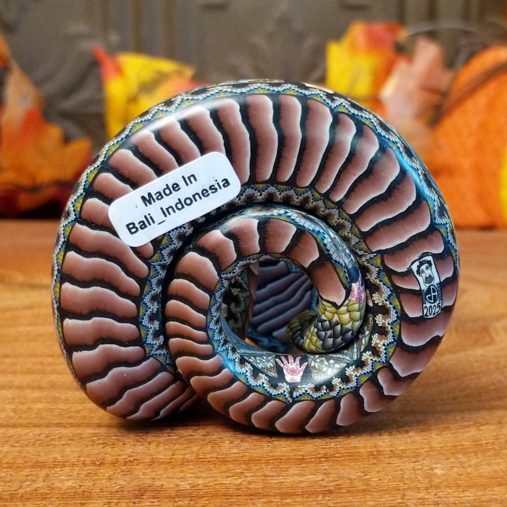 The underside of the piece showcases the year it was made.