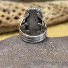 Rectangle bumblebee jasper ring by Terry Wood, featuring a vibrant rectangular bumblebee jasper stone with natural yellow, orange, black, and gray patterns set in a handcrafted sterling silver band.  Underside view.
