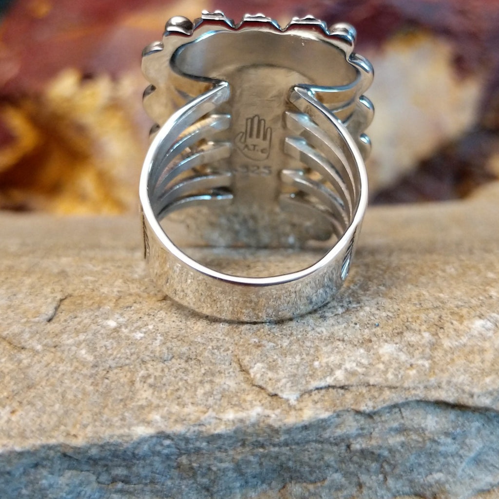 Polished sterling silver band of the ring.