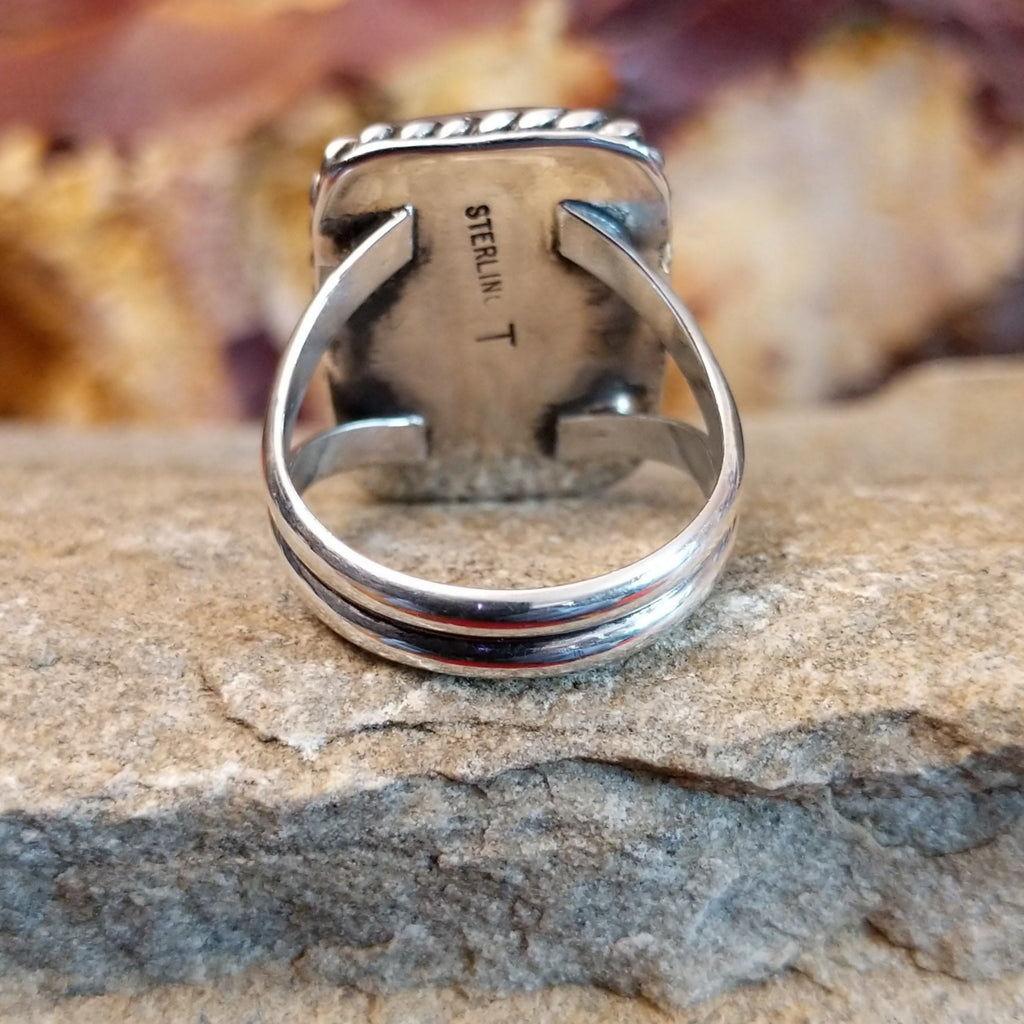 A dual layered band in sterling silver of the ring.