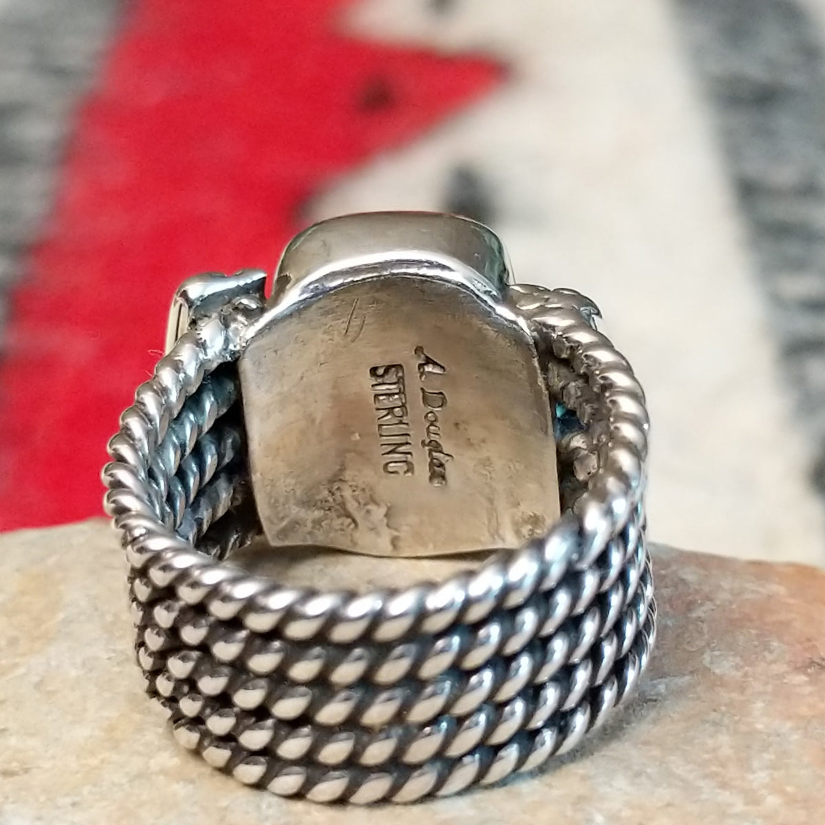 Close up of the artist's stamped signature