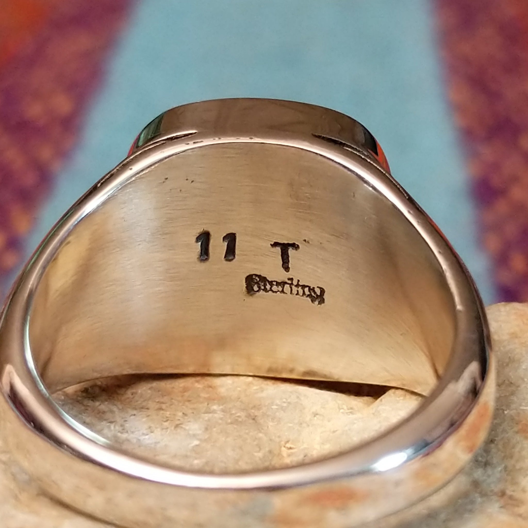 Close up of the artist's stamped signature