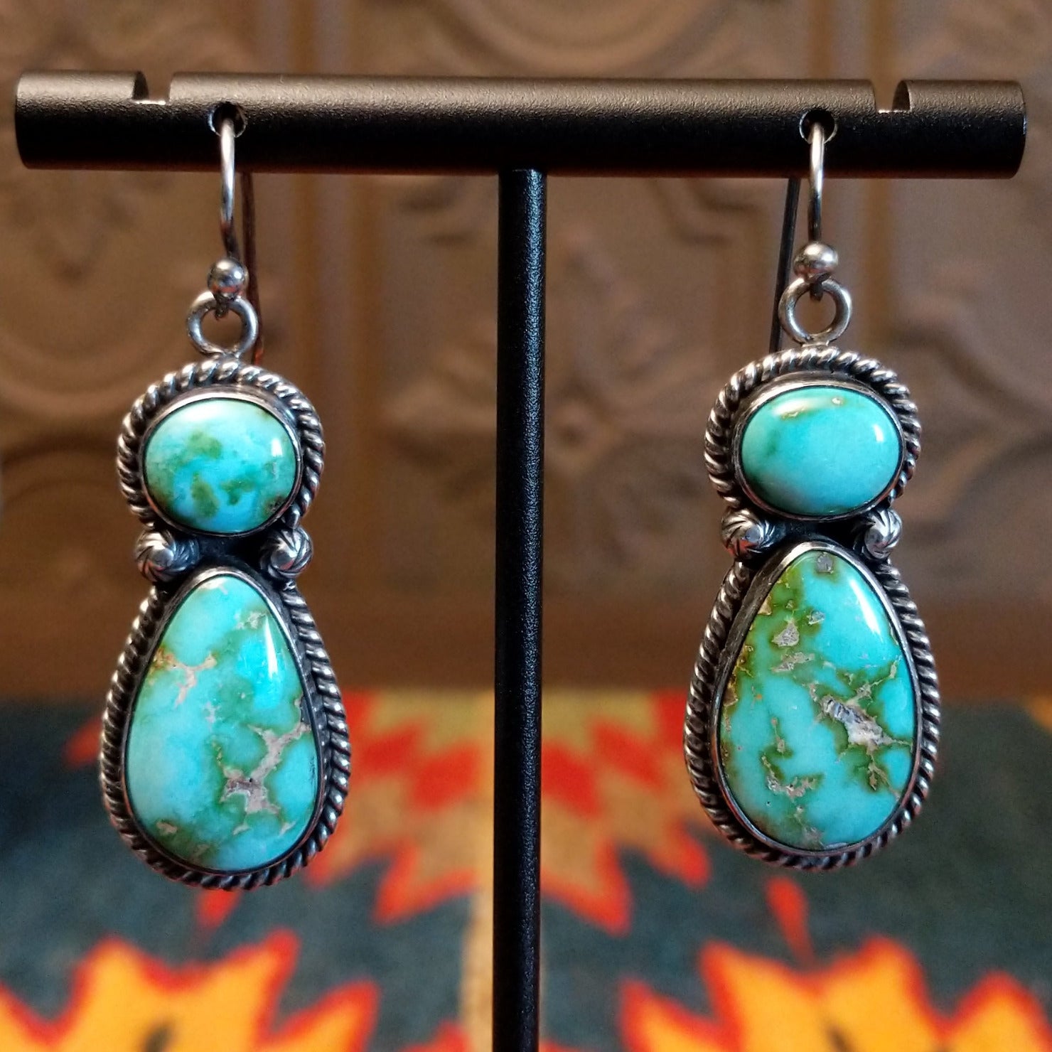 Earrings with Sonoran Gold turquoise set in bezels framed by twisted rope and dotted accents.