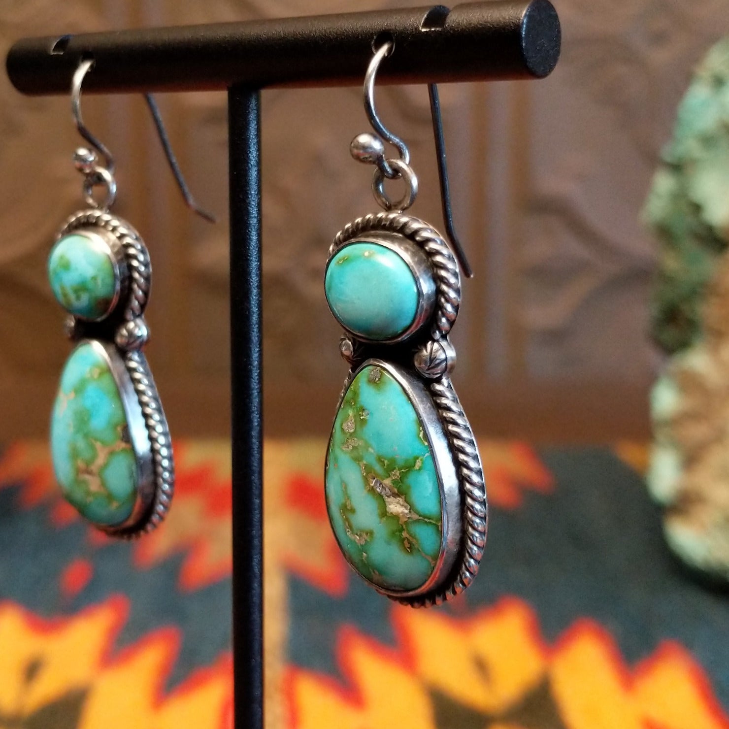 Earrings with Sonoran Gold turquoise set in bezels framed by twisted rope and dotted accents.