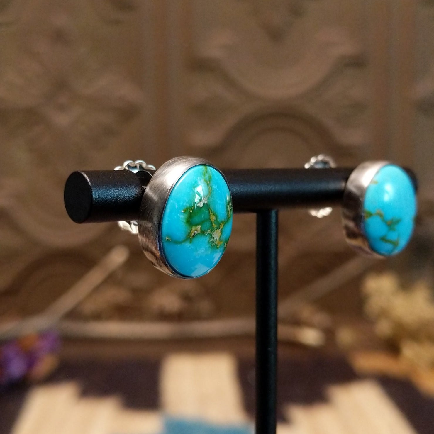 Sterling silver post earrings with Sonoran gold turquoise set in round bezels.
