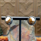Wild horse stones set in twisted rope bezels. 