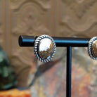 Wild horse stones set in twisted rope bezels. 
