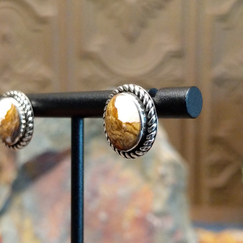 Wild horse stones set in twisted rope bezels. 