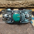 Royston turquoise cuff by Murphy Platero, featuring a vibrant blue and green Royston turquoise stone with natural matrix set in a handcrafted sterling silver open cuff.