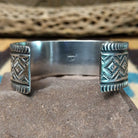 Royston turquoise cuff by Murphy Platero, featuring a vibrant blue and green Royston turquoise stone with natural matrix set in a handcrafted sterling silver open cuff.  Underside view.