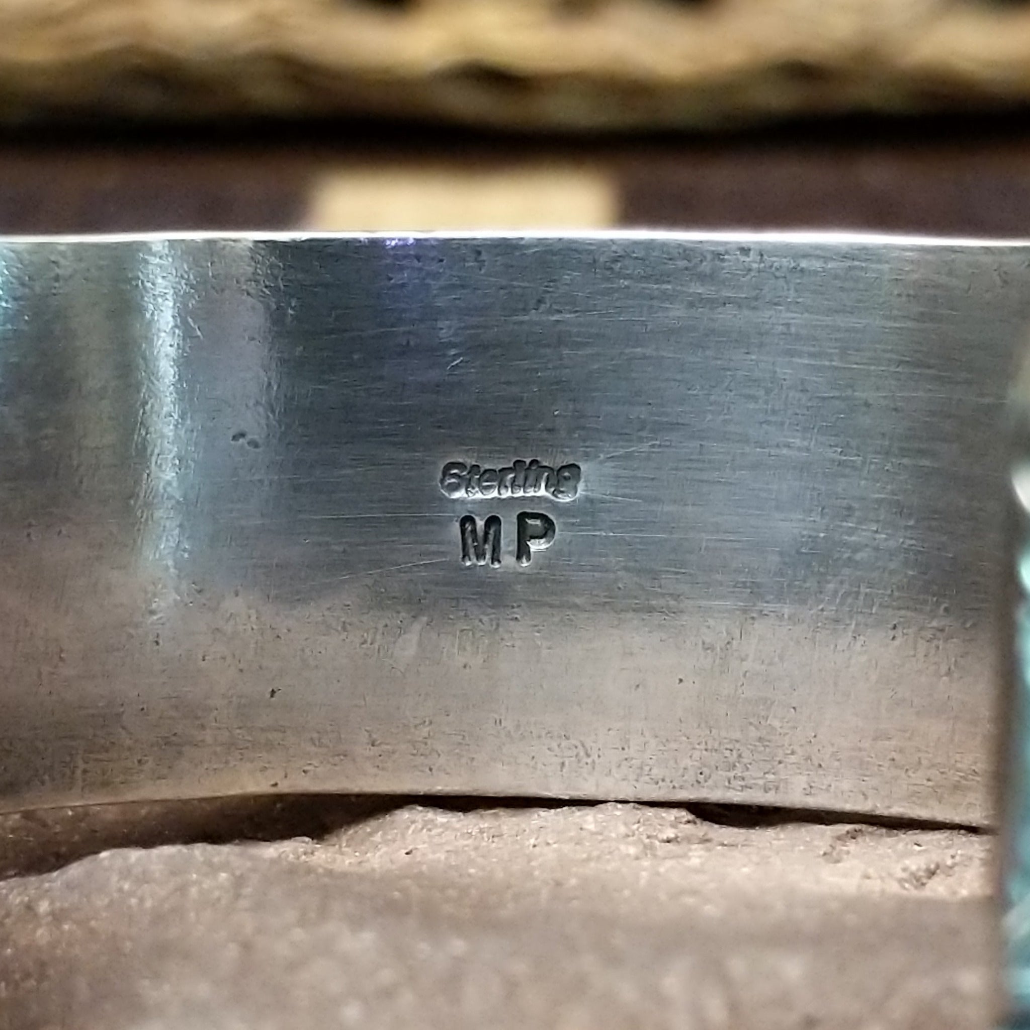 Royston turquoise cuff by Murphy Platero, featuring a vibrant blue and green Royston turquoise stone with natural matrix set in a handcrafted sterling silver open cuff; artisan and Sterling Silver stamp.