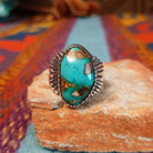 Royston Turquoise Ring by Raymond Coriz with large matrixed stone and radiating silverwork.