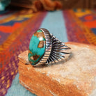 Royston Turquoise Ring by Raymond Coriz with large matrixed stone and radiating silverwork.