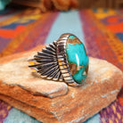 Royston Turquoise Ring by Raymond Coriz with large matrixed stone and radiating silverwork.