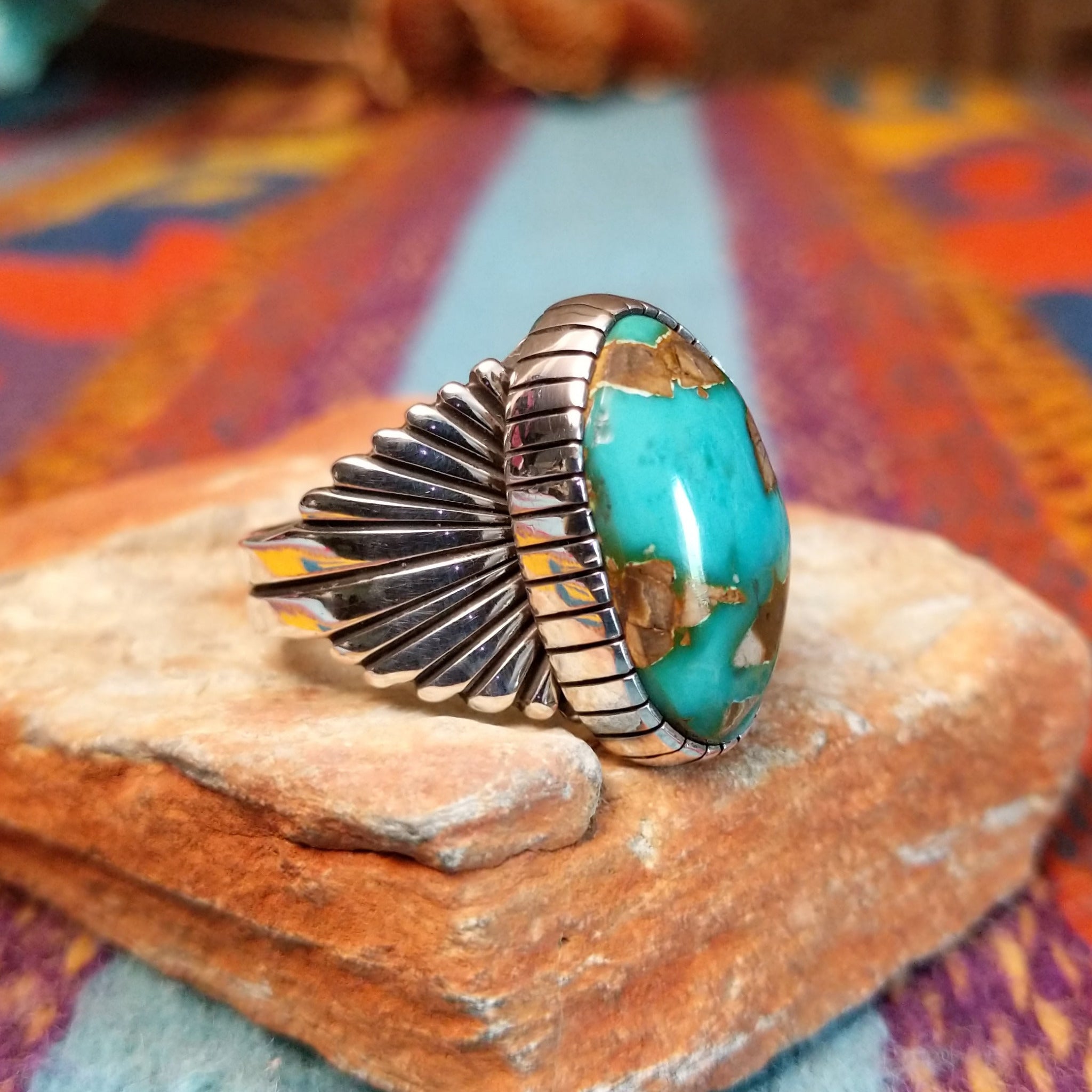 Royston Turquoise Ring by Raymond Coriz with large matrixed stone and radiating silverwork.