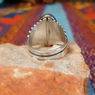 Royston Turquoise Ring by Raymond Coriz with large matrixed stone and radiating silverwork.