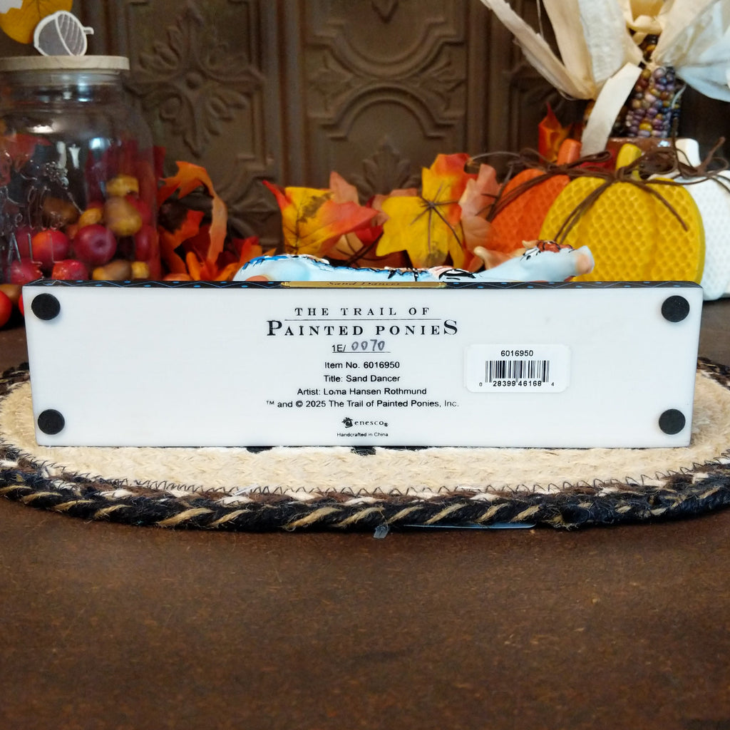 The underside of the base contains information about the piece.