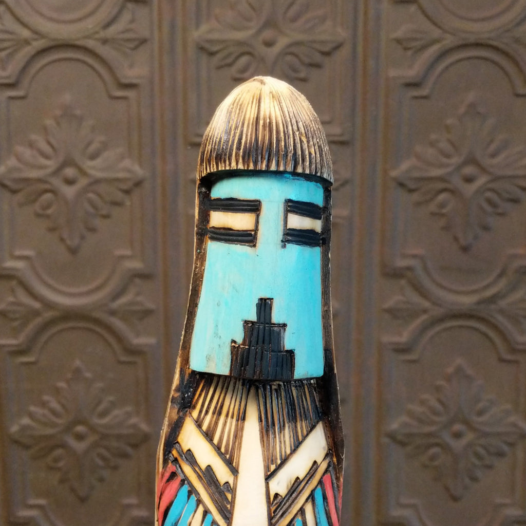 Close-up of the blue face of the shalako kachina.