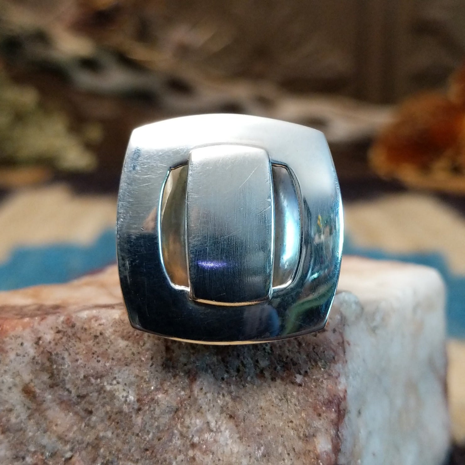 Sterling silver ring with bridge centerpiece.