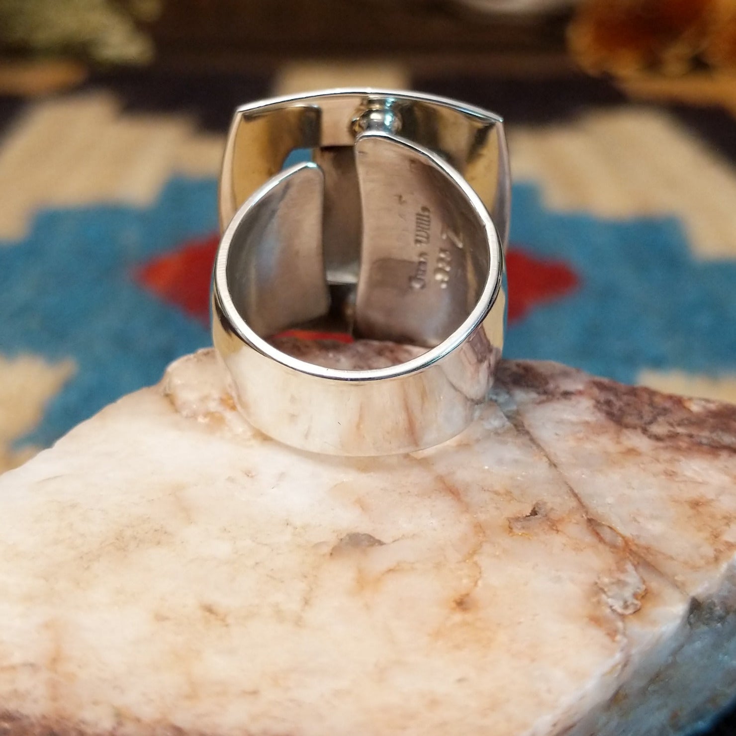 Sterling silver ring with bridge centerpiece.