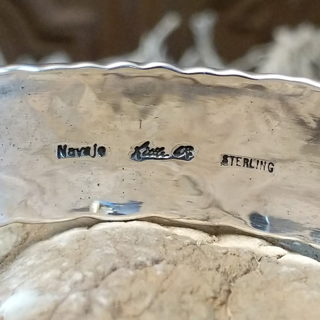 Close-up of the artisans' signatures on the interior.