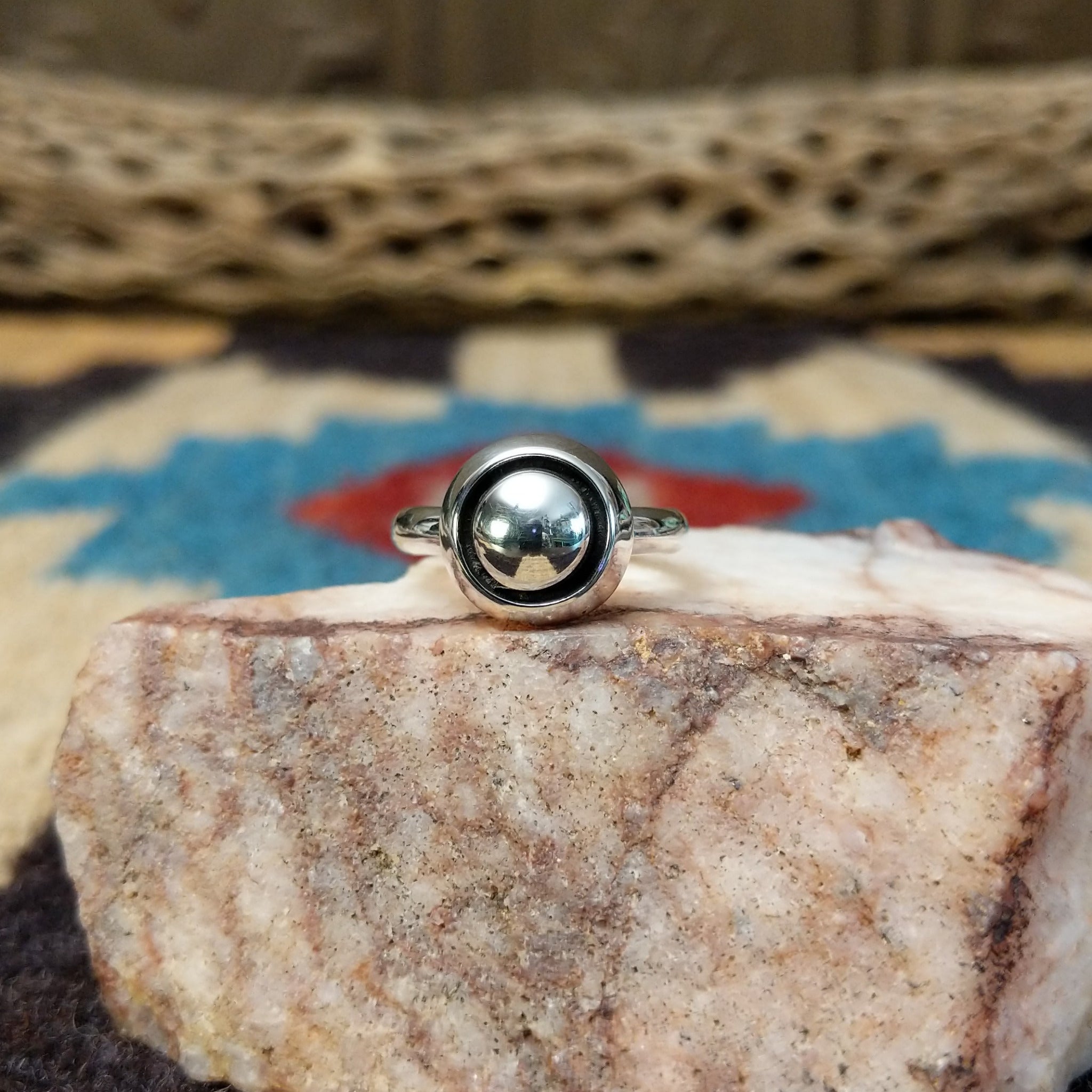 Silver dome shadowbox ring by Tricia Smith, featuring a handcrafted sterling silver dome with a dimensional shadowbox design and polished finish.