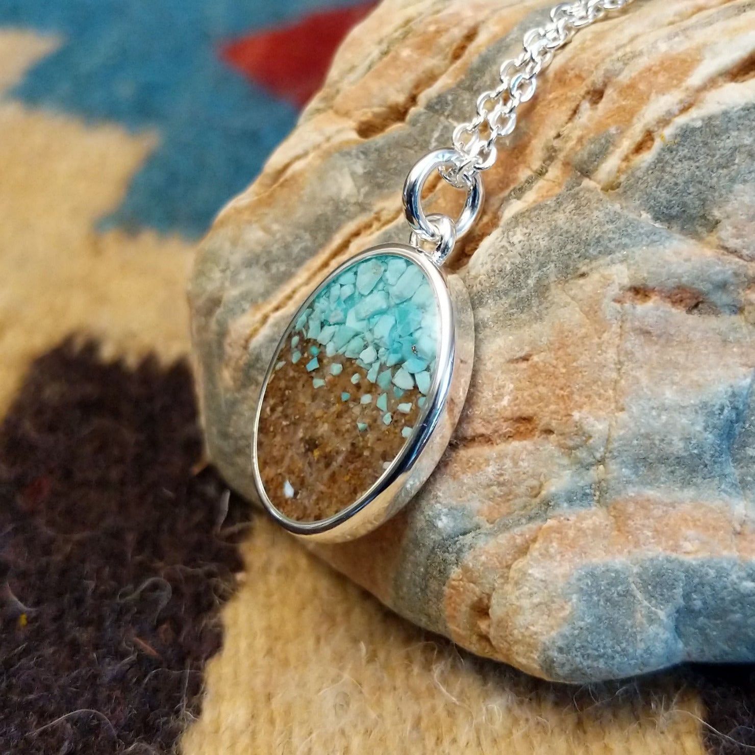 Silver-plated brass necklace with turquoise and San Pedro River sand set in the oval bezel.