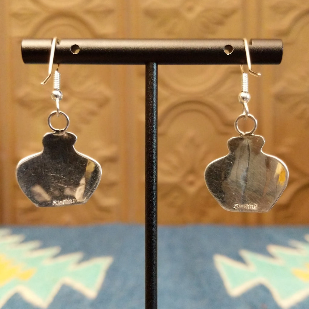 Stamp is found on the back of the earrings.