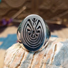 Sterling silver ring with man in the maze motif.