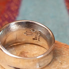 Close up of the artist's stamped signature
